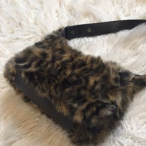 Leopard fur handbag